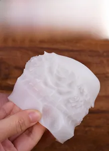 Close-up of flexible floral silicone mold showing detailed rose patterns for DIY crafts