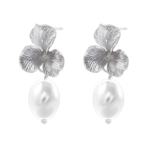 Close-up of elegant silver flower stud earrings with white oval pearls on white background