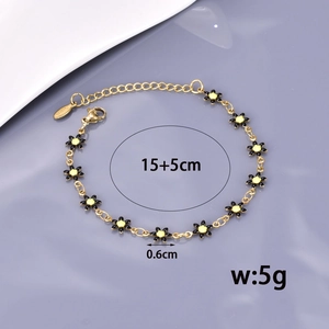 Bracelet marguerite en acier titane doré avec fleurs en émail coloré et chaîne réglable