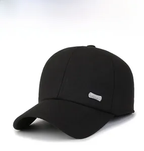 Close-up of black men's winter baseball cap with silver SSPORT metal logo detail