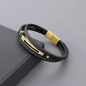 Men's double-layer black leather bracelet with golden magnetic clasp on display box