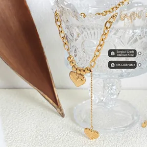 Collier imposant en acier titane plaqué or 18 carats avec doubles pendentifs cœur