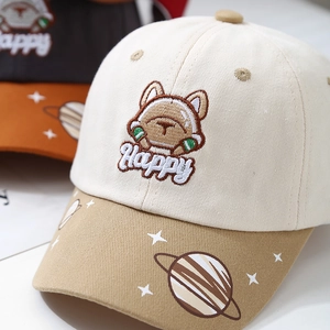 Kids baseball cap featuring cartoon puppy astronaut embroidery and starry space patterns