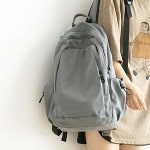 Grey minimalist large capacity backpack for students with multiple zipper compartments