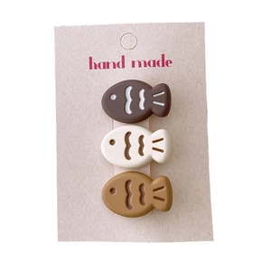 Set of 3 cute cartoon fish hair clips in brown and beige tones for girls