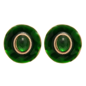 Boucles d'oreilles vintage vert émeraude avec bordure dorée et forme ronde géométrique