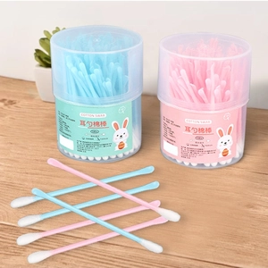Dual-head cotton swabs with ear spoon tips in pink and blue plastic canisters