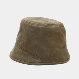 Detailed close-up showing the soft suede texture and stitching on the brown bucket hat