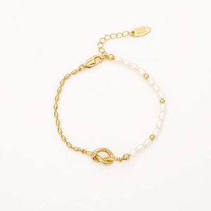 Elegant gold knot and pearl bracelet with adjustable chain for women in a sleek design