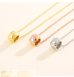Three-color diamond quilted sphere pendants on thin chains in gold, rose gold and silver