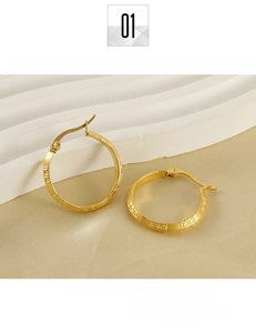 Close-up of 18K gold plated titanium steel earrings with Greek key pattern detail