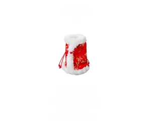 Detail of red Chinese style pet vest with gold floral patterns and plush white trim