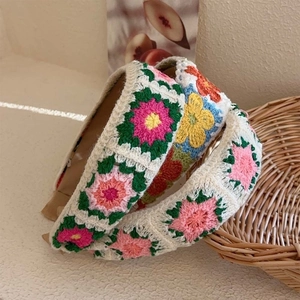 Handmade granny square crochet headbands with floral embroidery in bohemian style