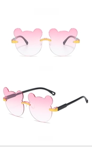 Detailed front and side view of pink bear ear shaped rimless sunglasses for kids with gold accents