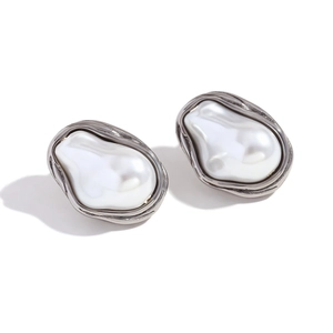 Irregular baroque pearl earrings with silver textured metal edges in minimalist style