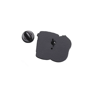Back view of cute coffee enamel pin featuring a black rubber clutch and matte metal texture