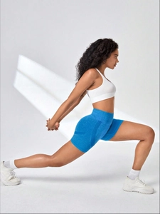Detail of royal blue high waist seamless yoga shorts with non-slip ribbed side texture
