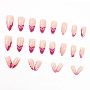 Sweet almond press-on nails set with red hearts and star patterns on nude pink base