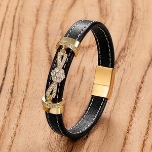 Men's black leather infinity bracelet with gold-plated buckle and sparkling rhinestones