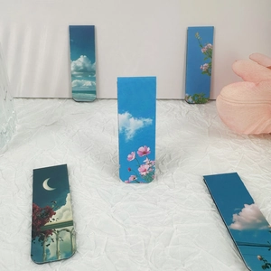 Cloud and floral scenery magnetic bookmarks set on a minimalist white background