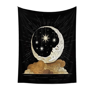 Detail of celestial sun moon tapestry with golden clouds on black polyester fabric