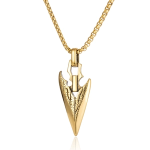 Vintage gold stone age arrowhead pendant with box chain on a clean white background