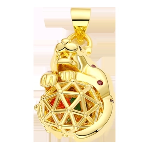 Gold lion pendant with colorful gems in a geometric hollow sphere and detailed carvings