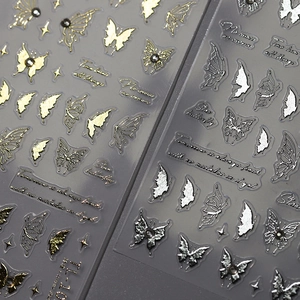 3D metallic butterfly and star nail art stickers with embossed relief in gold and silver