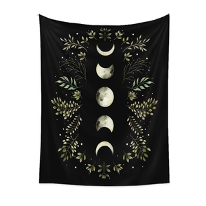 Detailed view of black tapestry featuring vertical lunar phases and botanical leaf patterns