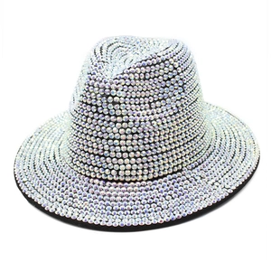 Top view of a silver rhinestone fedora hat with a black brim for stage performance