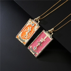 Tarot card pendants in 18K gold plated copper with enamel world and hanged man designs