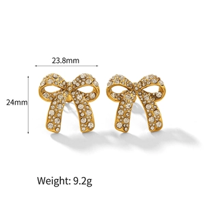 Sparkling gold-plated bow earrings with inlaid rhinestones measuring 24mm in height