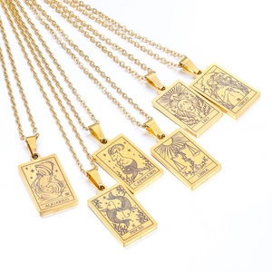 Close-up of six gold stainless steel zodiac necklaces with engraved constellation names