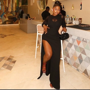 Slim fit black long sleeve maxi dress with side slit and cutout neckline detail