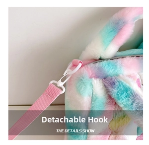 Detail of detachable white plastic hook and rainbow plush fabric on unicorn bag