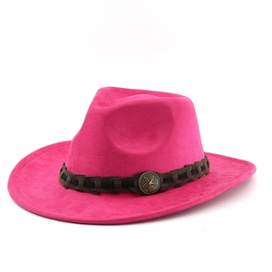 Detail of rose red suede fedora hat with brown braided band and bronze star emblem