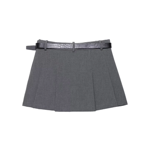 Dark grey pleated mini skirt with black crocodile texture belt on white background