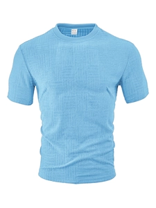 Detailed close-up of bright blue polyester fabric with unique 3D square waffle texture