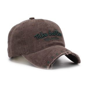 Detail of vintage distressed baseball cap with Take Boston embroidery and frayed brim