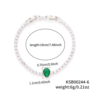 Silver tennis bracelet with square zircons and pear-cut green stone on white background