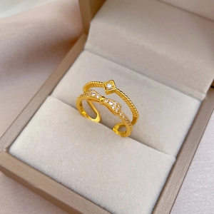 Double-layered gold bow ring with square zircon and micro-pave diamonds in a gift box