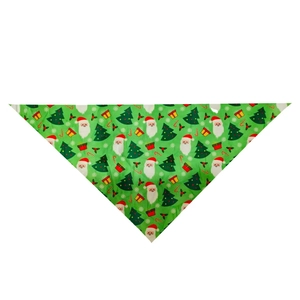 Detailed view of a green Christmas pet bandana with Santa Claus and tree patterns