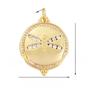 Detailed view of a golden dragonfly pendant with white zircons and size specifications