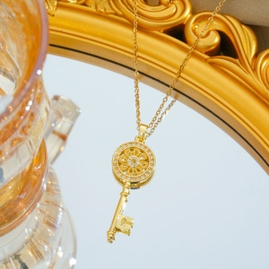 Luxury titanium steel key pendant necklace with white cubic zirconia in gold finish