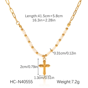 Detail of freshwater pearl necklace with gold cross pendant including size measurements
