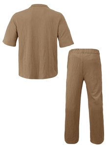 Detail view showing back of brown seersucker short-sleeved shirt and trousers set