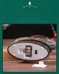 Detail view of Christmas lantern base with AG13 battery compartment and ON/OFF switch