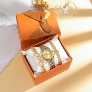 Coffret cadeau montre quartz dorée pour femme et bracelets sertis de diamants fins