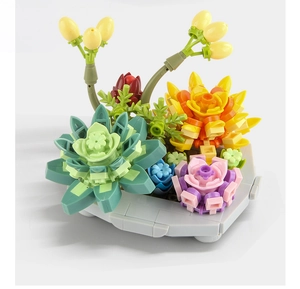 Detailed view of colorful building block succulent plants with grey base pot model