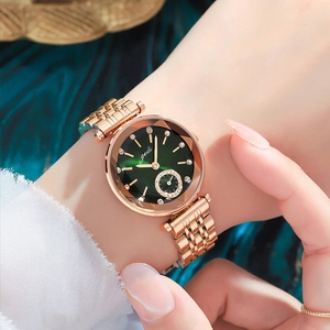 Elegant rose gold steel watch for women featuring a deep green dial and crystal accents